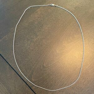 14K white gold chain, adjustable from 19.5” to 21.5”, lobster clasp